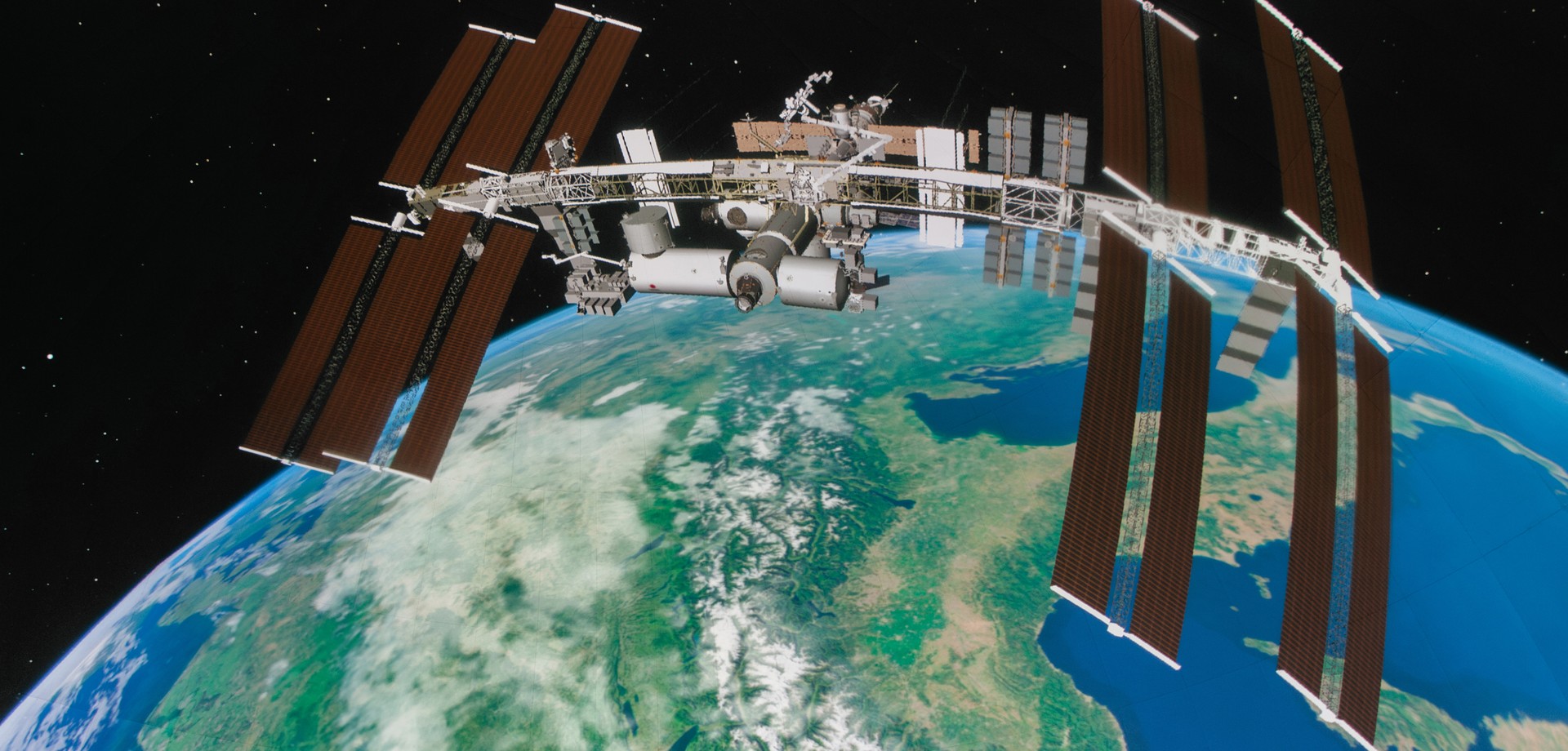 Die Internationale Raumstation (ISS) über der Erde.
