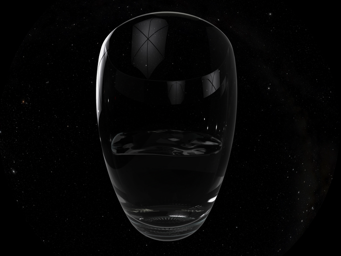 Ein Trinkglas mit Wasser im Universum. (vergrößerte Bildansicht wird geöffnet)